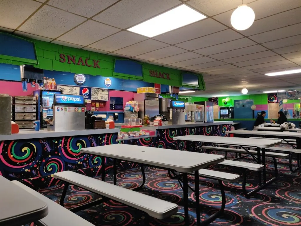 Snack Shack counter and seating at Skateville