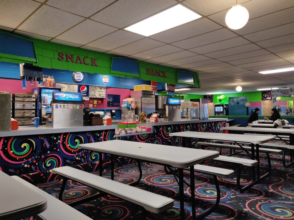Snack Shack counter and seating at Skateville